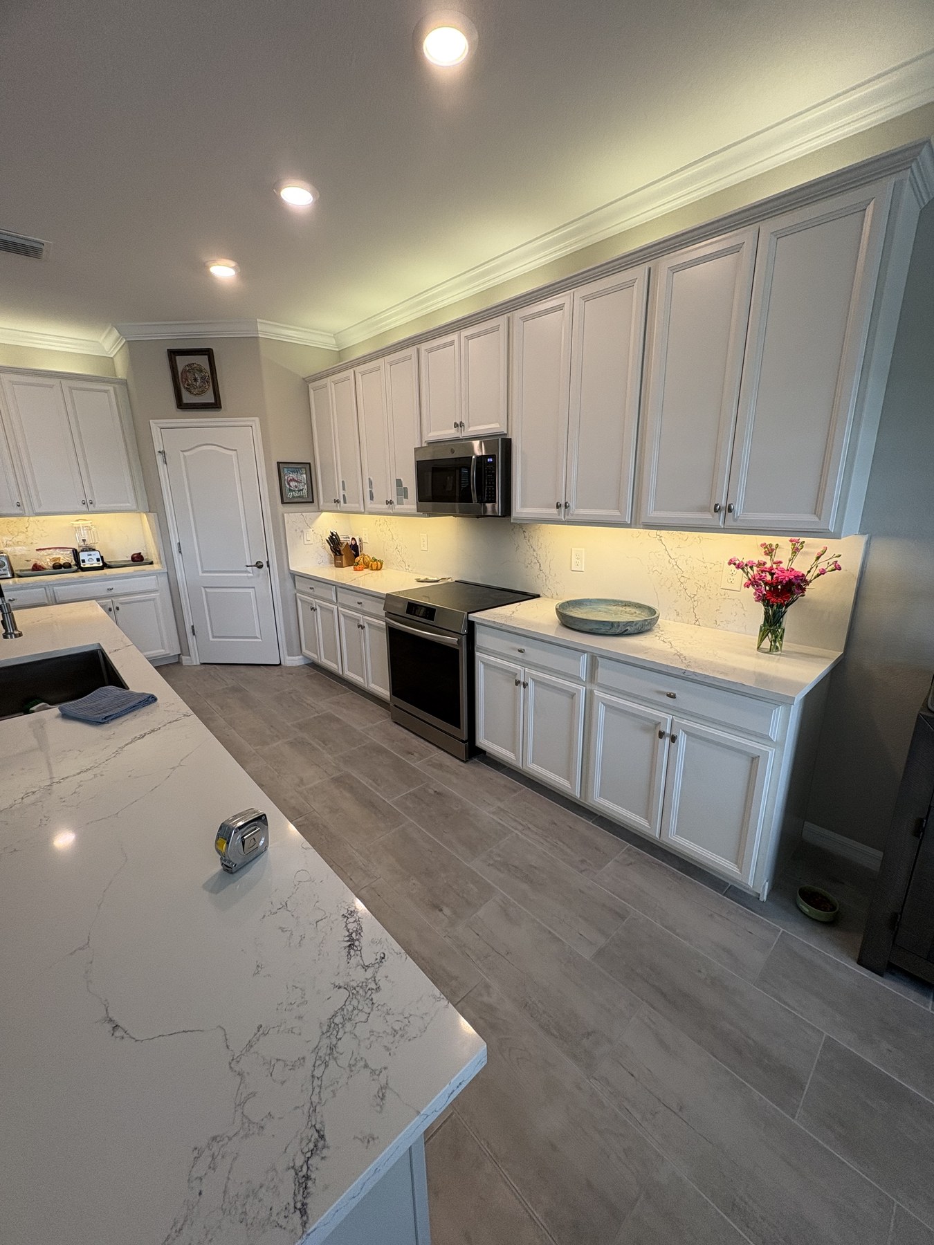 New cabinets and kitchen finish detail for Estero and Bonita Springs handyman services