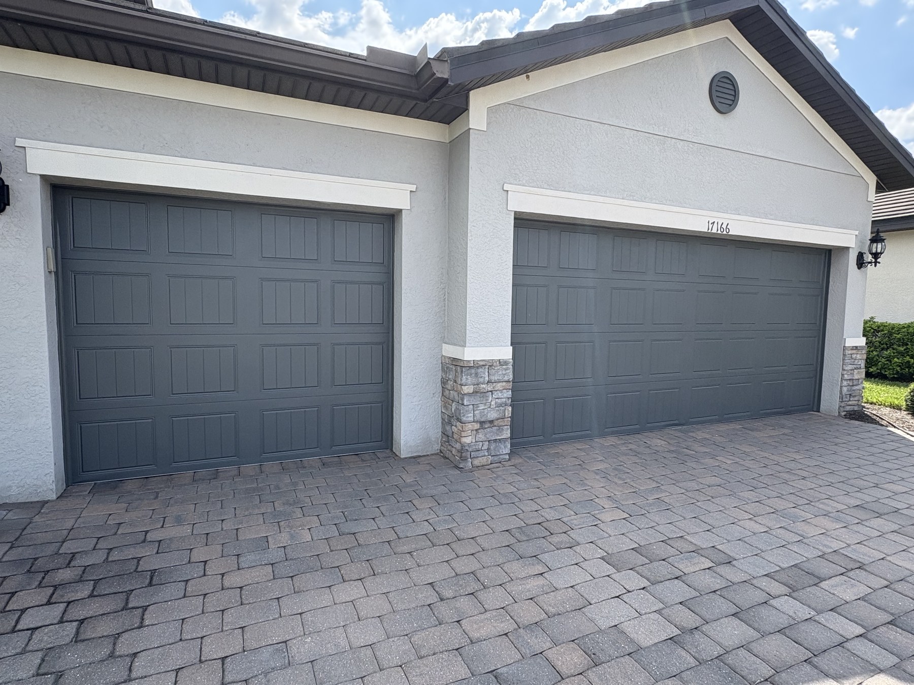 Painted garage door exterior finish for Fort Myers handyman home repair project