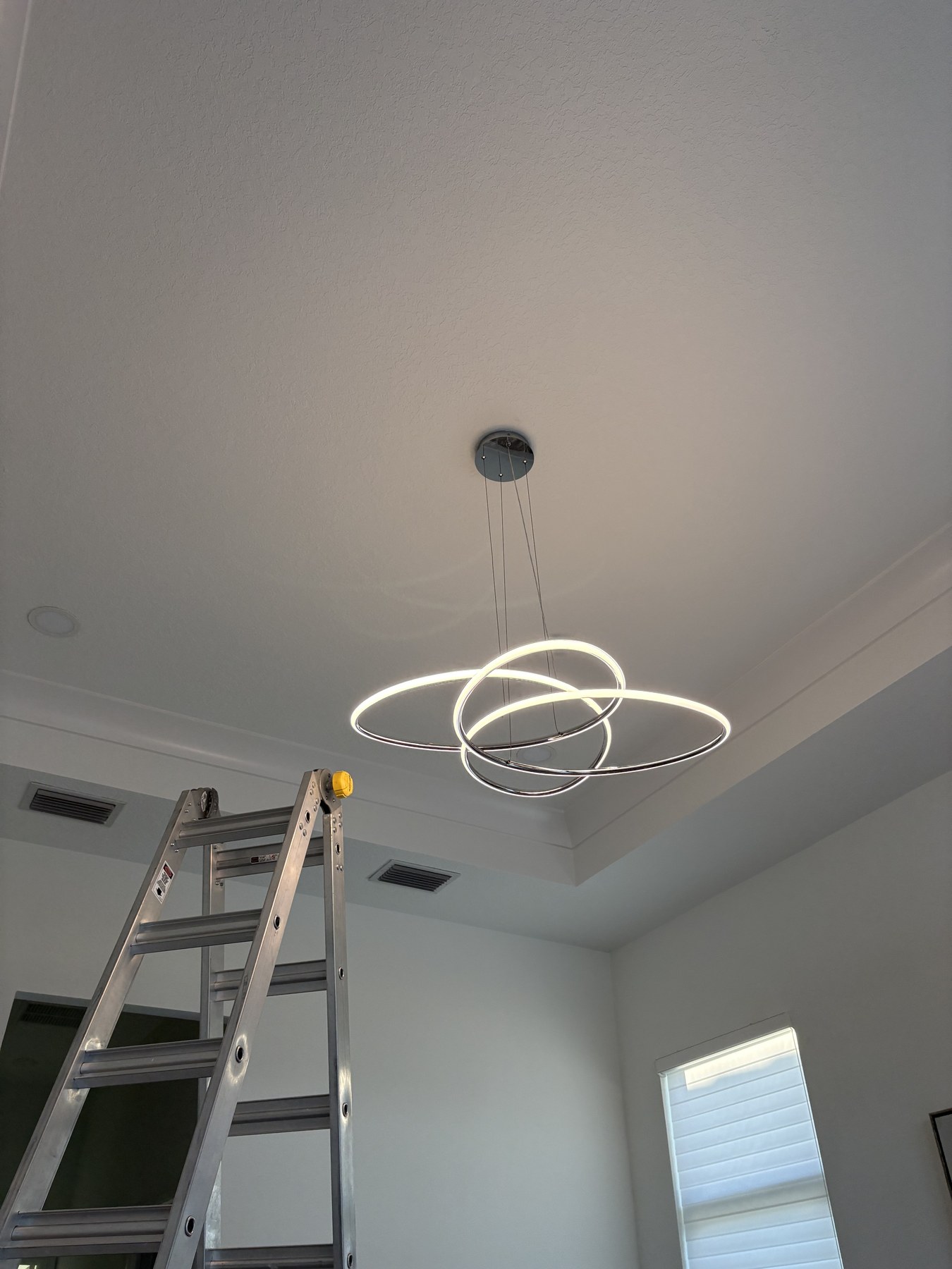 Modern light fixture installation for Punta Gorda home repair and fixture replacement